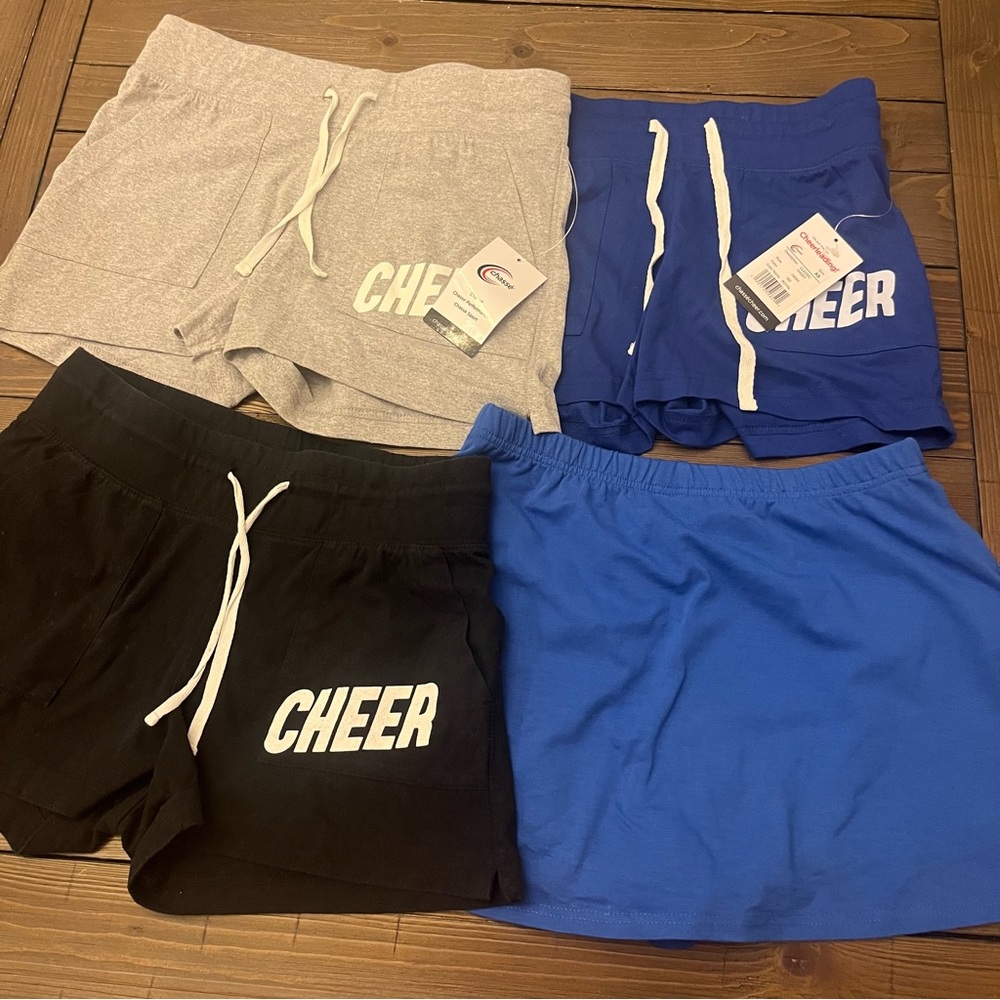 Blue, Grey, and Black Cheer Shorts and Blue Skirt